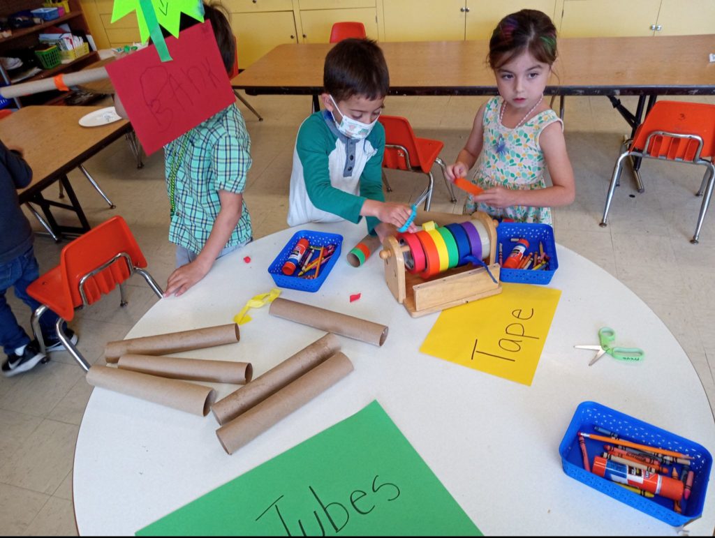 CUMC preschool kids building with tape